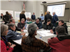 Group of citizens sitting around a table in McKinleyville