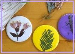 Make your own pin-on buttons with the library's button-maker! 