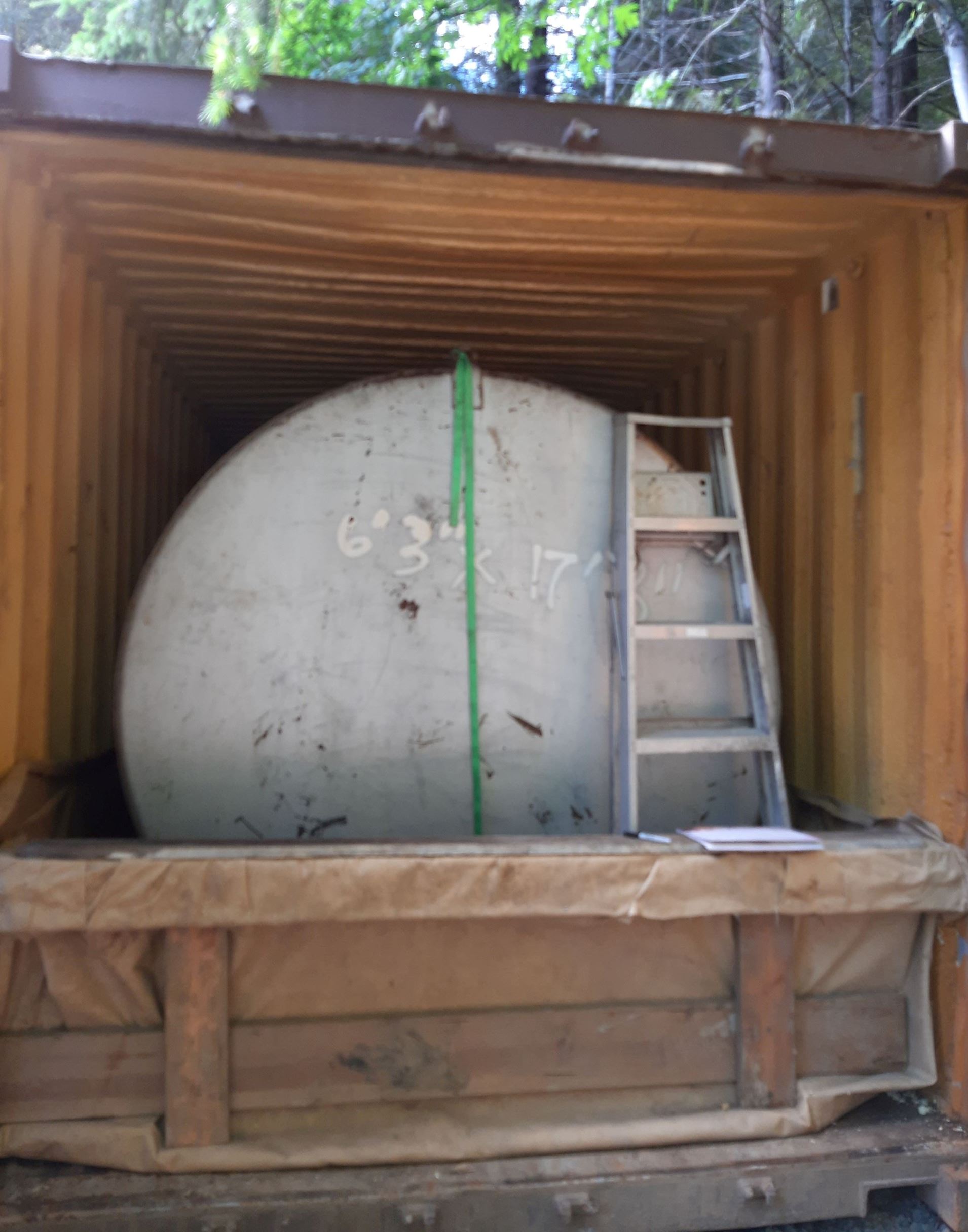 Large tank in a CONEX box