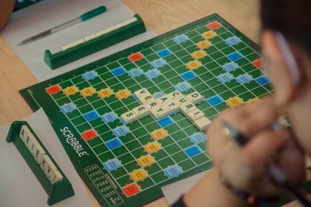 Scrabble. Take turns adding letters to the board that build on the words already there.