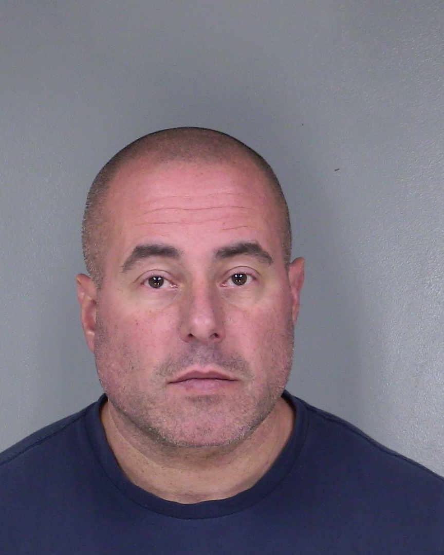 NICHOLAS MACHADO BOOKING PHOTO