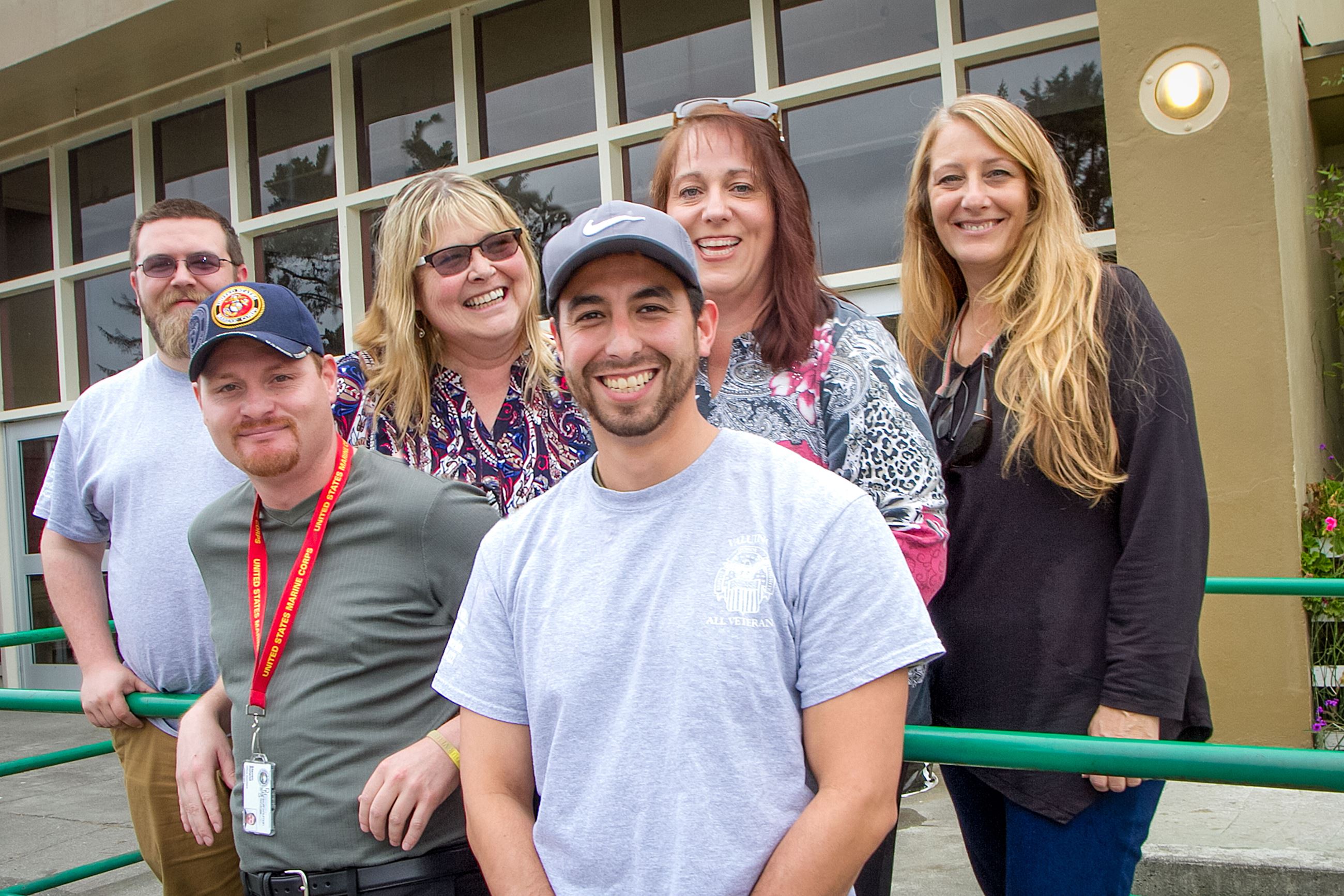 Group photo of 6 smiling VSO staffers
