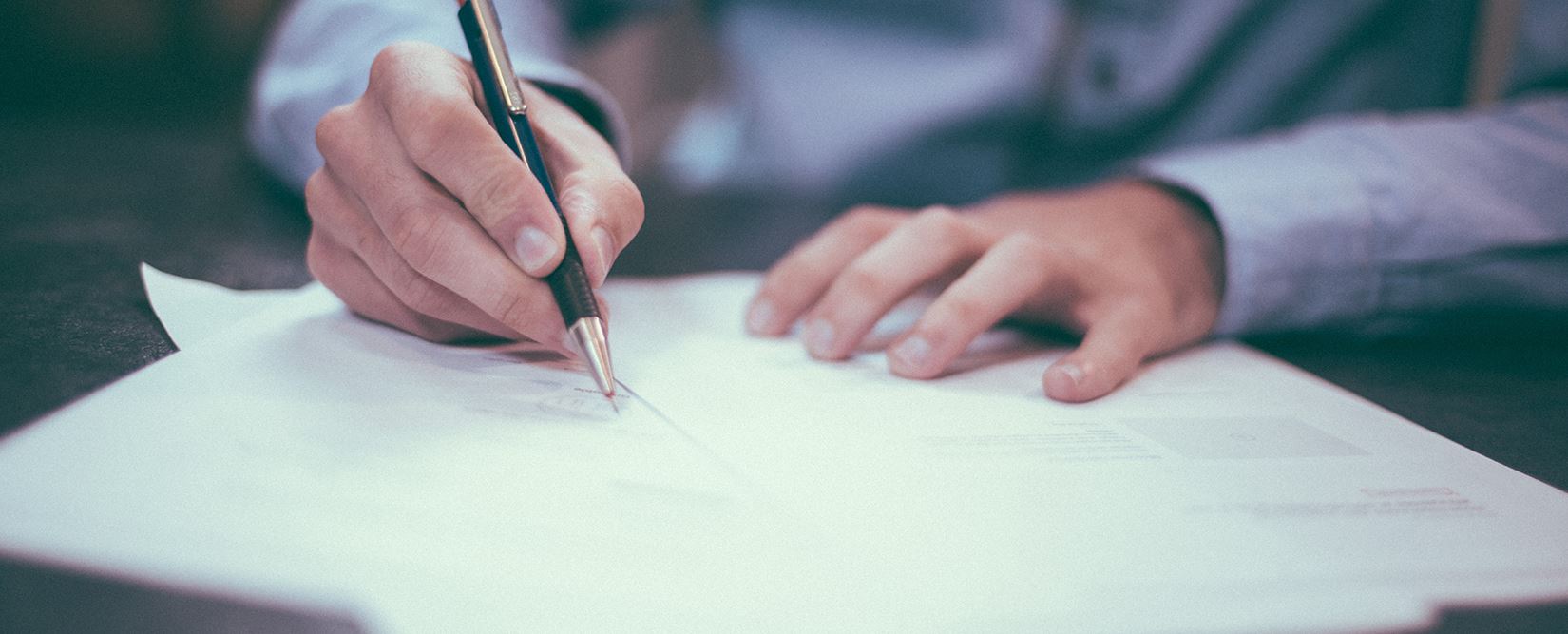 Photo of a person filling out a form