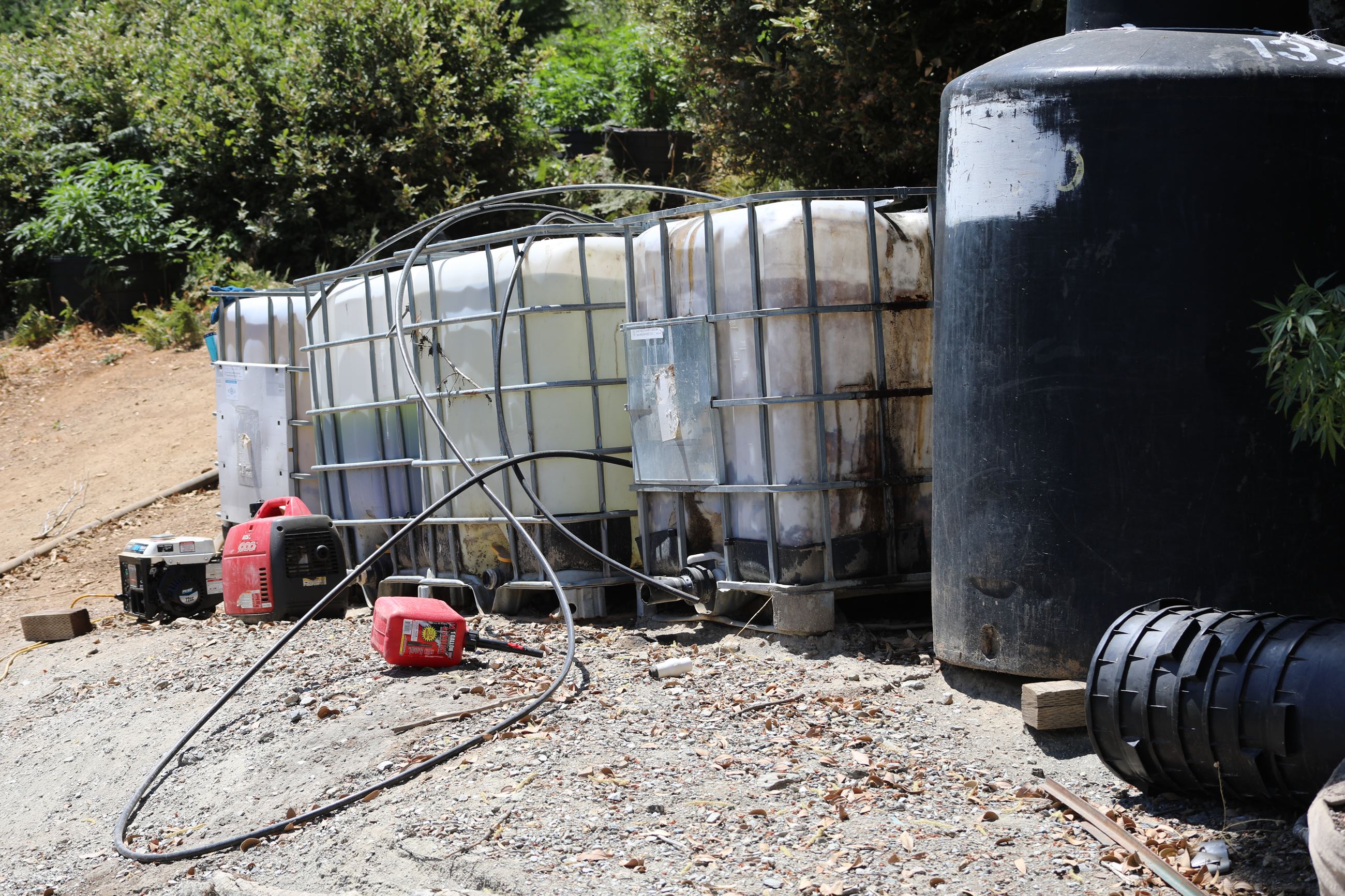 Multiple water storage containers, a generator and a gas can